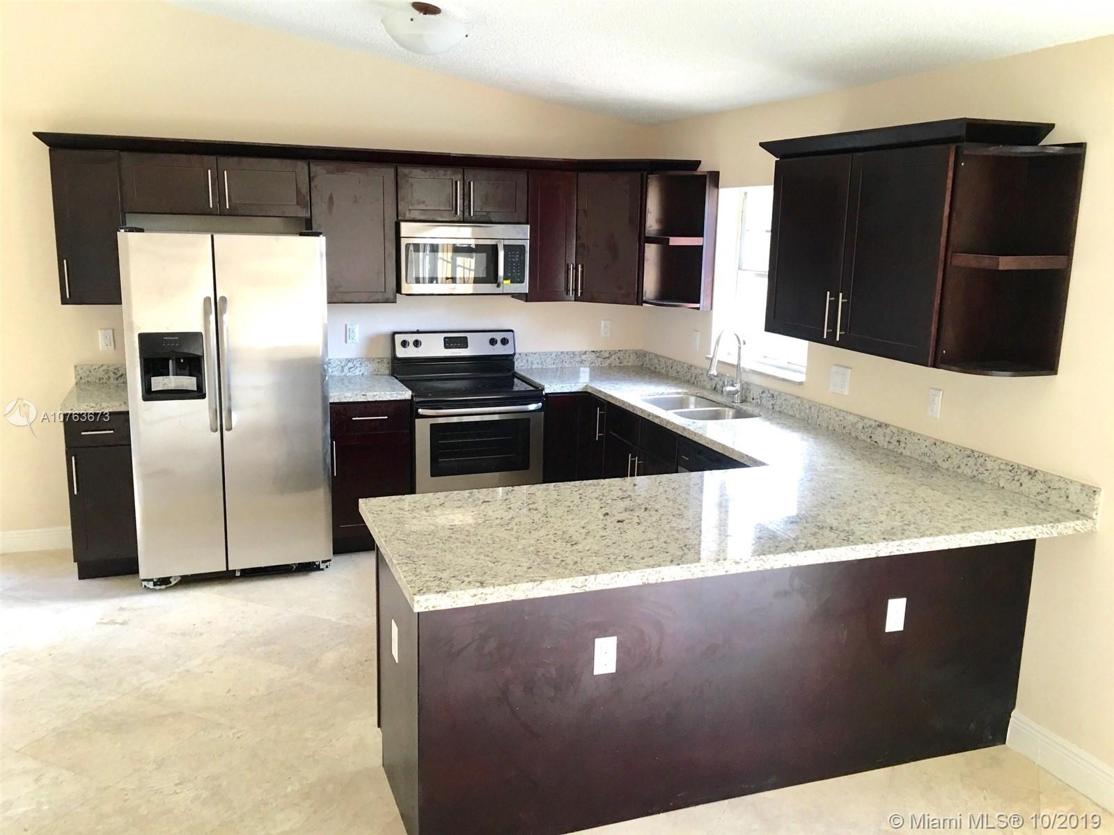 9752 Southwest 145th Place, Unit 9752 Miami, FL 33186 - Photo 2 of 7