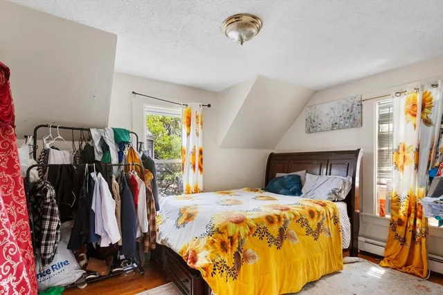 a bed room with a bed and a bed