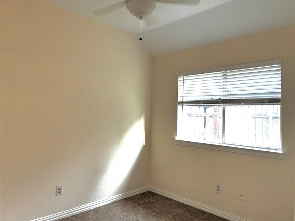7936 Tournament Road Frisco, TX 75035 - Photo 20 of 28 an empty room with a window