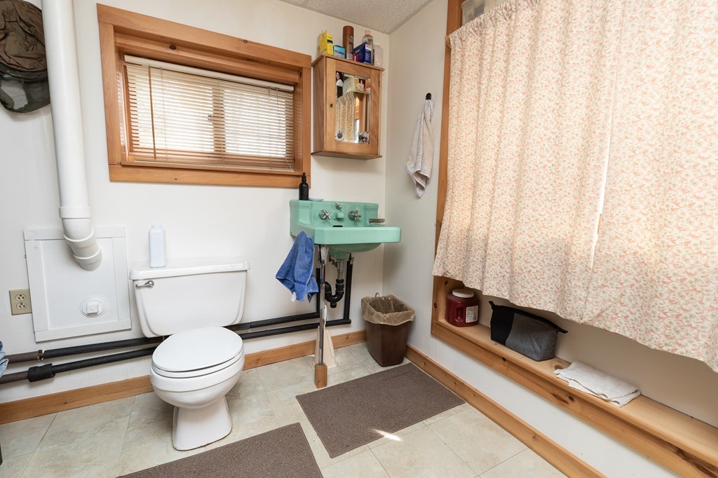 235 Bug Hill Road Ashfield, MA 01330 - Photo 15 of 30 a bathroom with a toilet and a shower