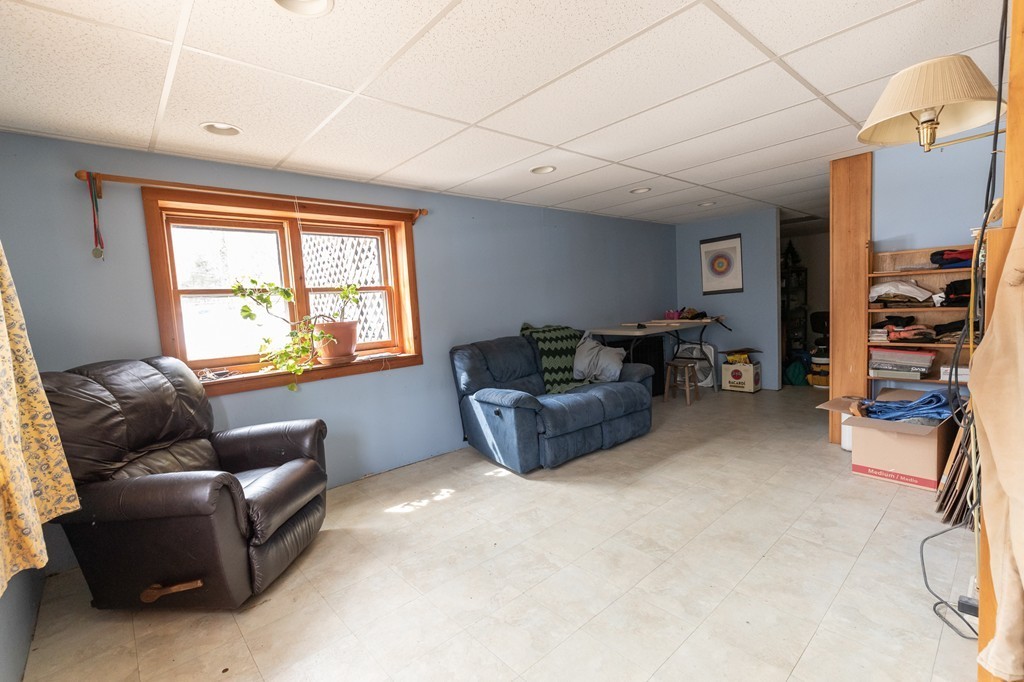 235 Bug Hill Road Ashfield, MA 01330 - Photo 17 of 30 a living room with furniture and a window