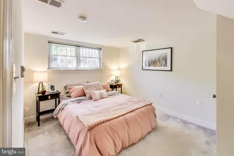 a picture of a bench in front of a door