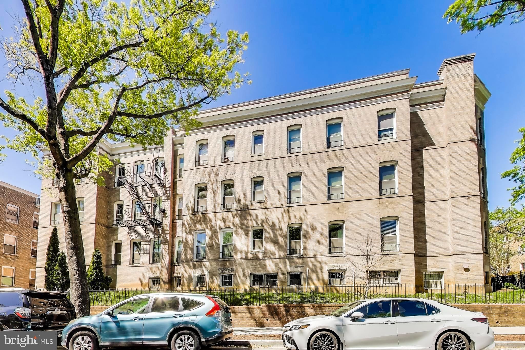 1106 Columbia Road Northwest, Unit 103 Washington, DC 20009 - Photo 20 of 21 a car parked in front of a building