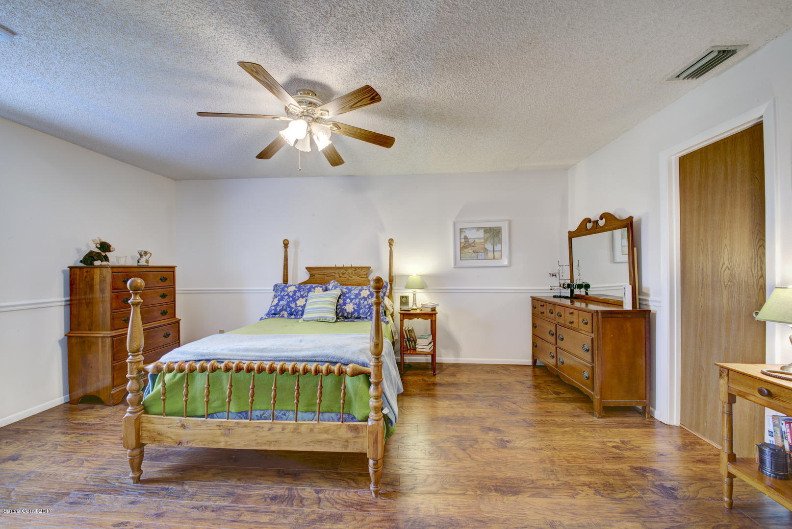 6670 Cairo Road Cocoa, FL 32927 - Photo 2 of 39 Master Suite with Wood Laminate Floor