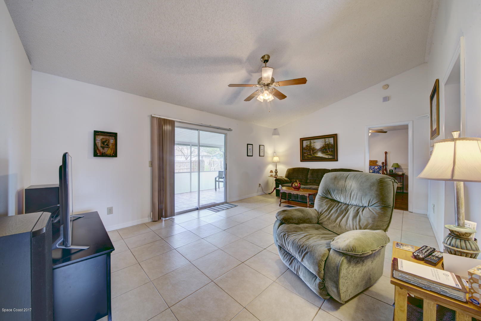 6670 Cairo Road Cocoa, FL 32927 - Photo 15 of 39 Family Room with Tile Floor