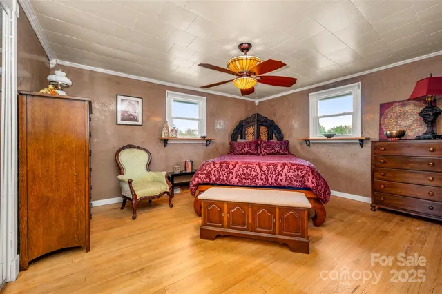 a bedroom with a bed and a walk in closet