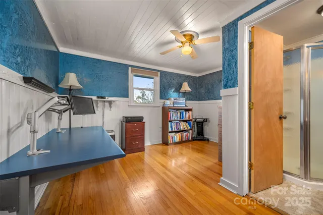 a bathroom with a sink toilet and a mirror