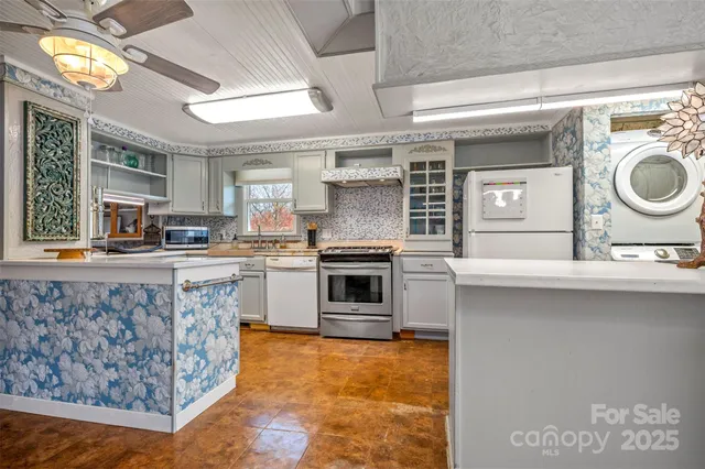 a bathroom with a granite countertop double vanity sink and a mirror