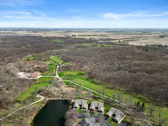 a view of a big yard with an trees
