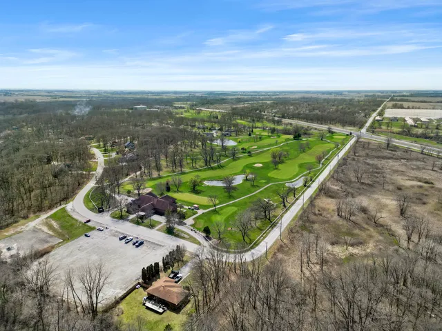 a view of a swimming pool with a garden
