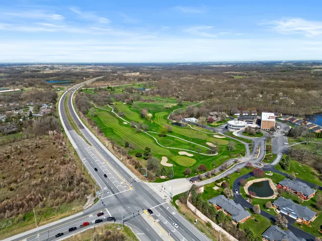 an aerial view of a city with lots of residential buildings