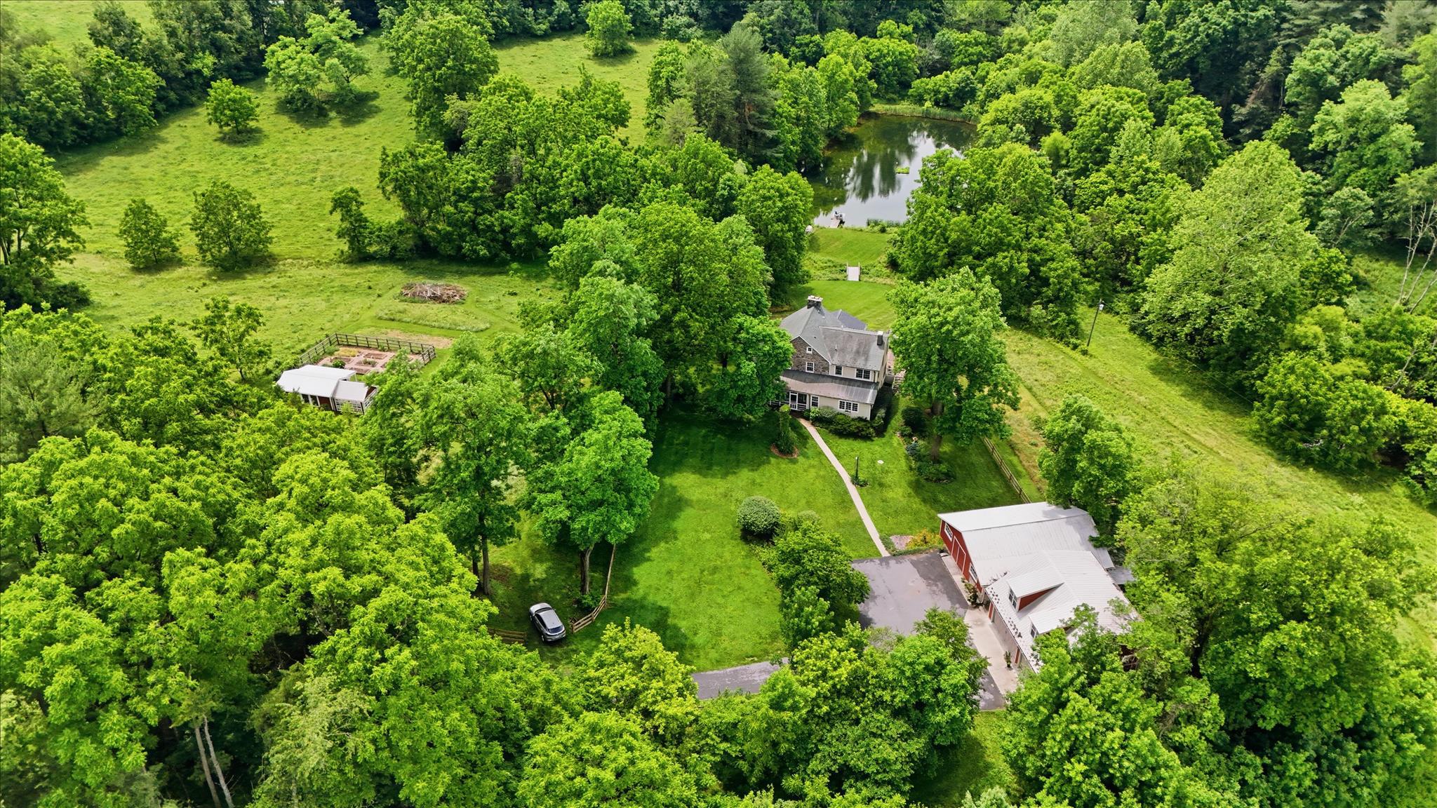 10919 Etzler Mill Road Woodsboro, MD 21798 - Photo 54 of 54 an aerial view of residential house with outdoor space and trees all around