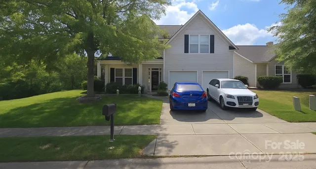 a car parked in front of a house