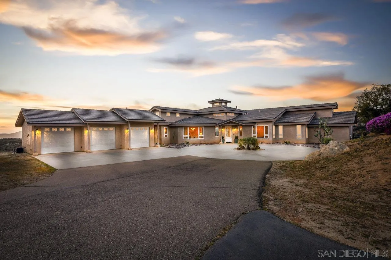 13192 Yerba Valley Way Lakeside, CA 92040 - Photo 1 of 58 a front view of a house with a yard and balcony