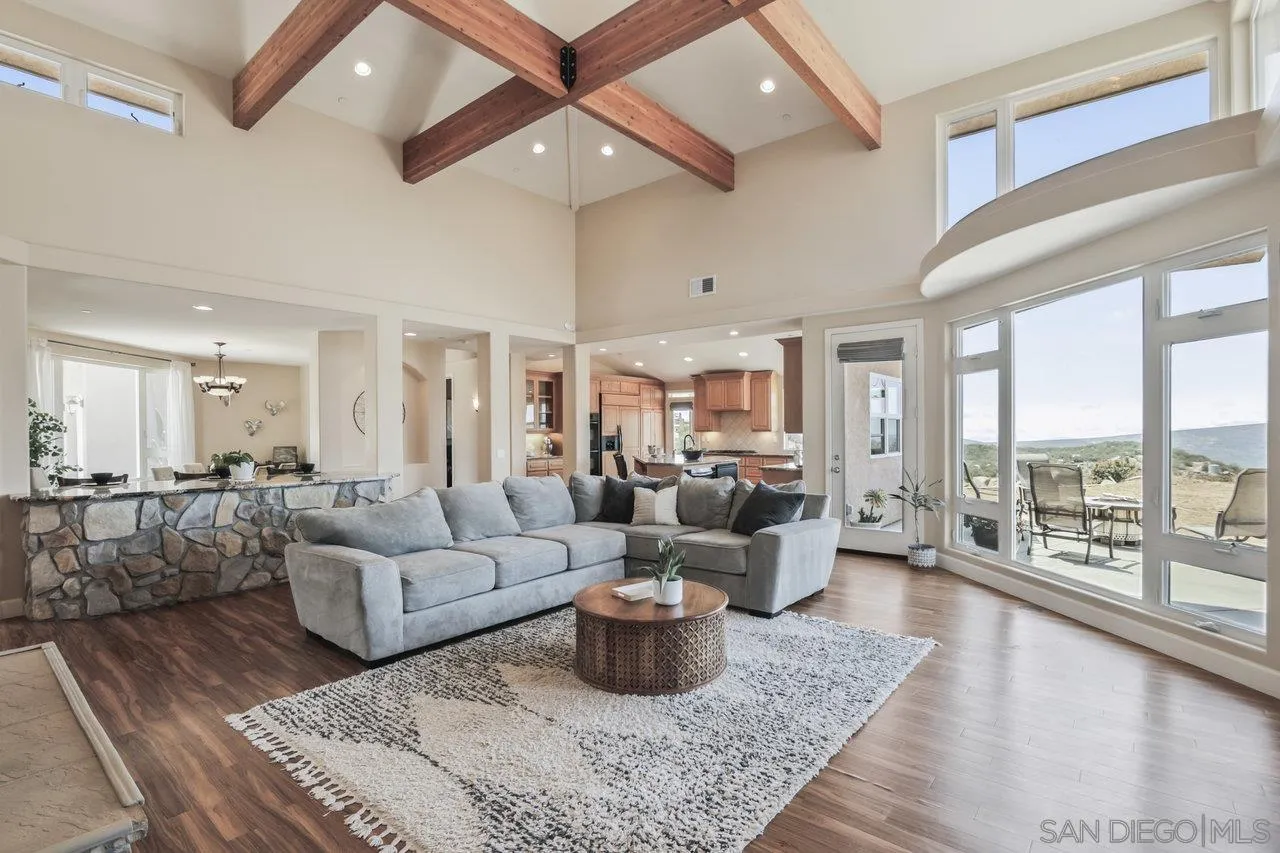 13192 Yerba Valley Way Lakeside, CA 92040 - Photo 16 of 58 a living room with lots of furniture and a rug