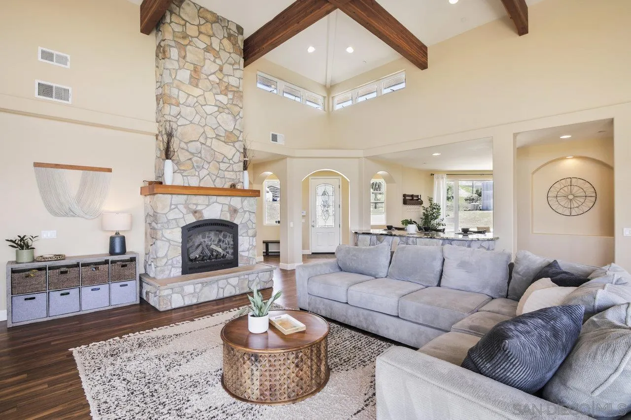 13192 Yerba Valley Way Lakeside, CA 92040 - Photo 17 of 58 a living room with furniture and a fireplace