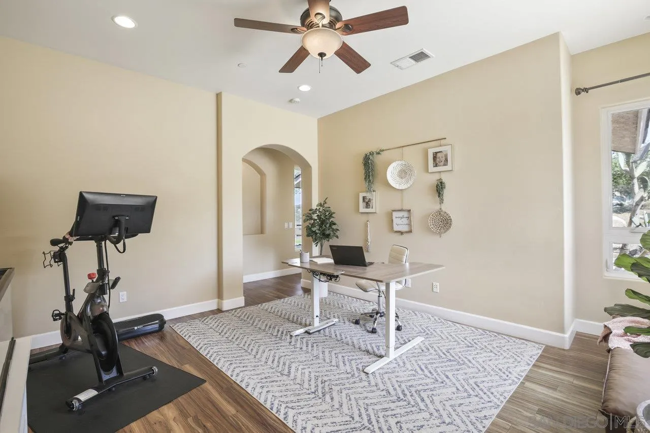 13192 Yerba Valley Way Lakeside, CA 92040 - Photo 24 of 58 a work room with furniture and wooden floor