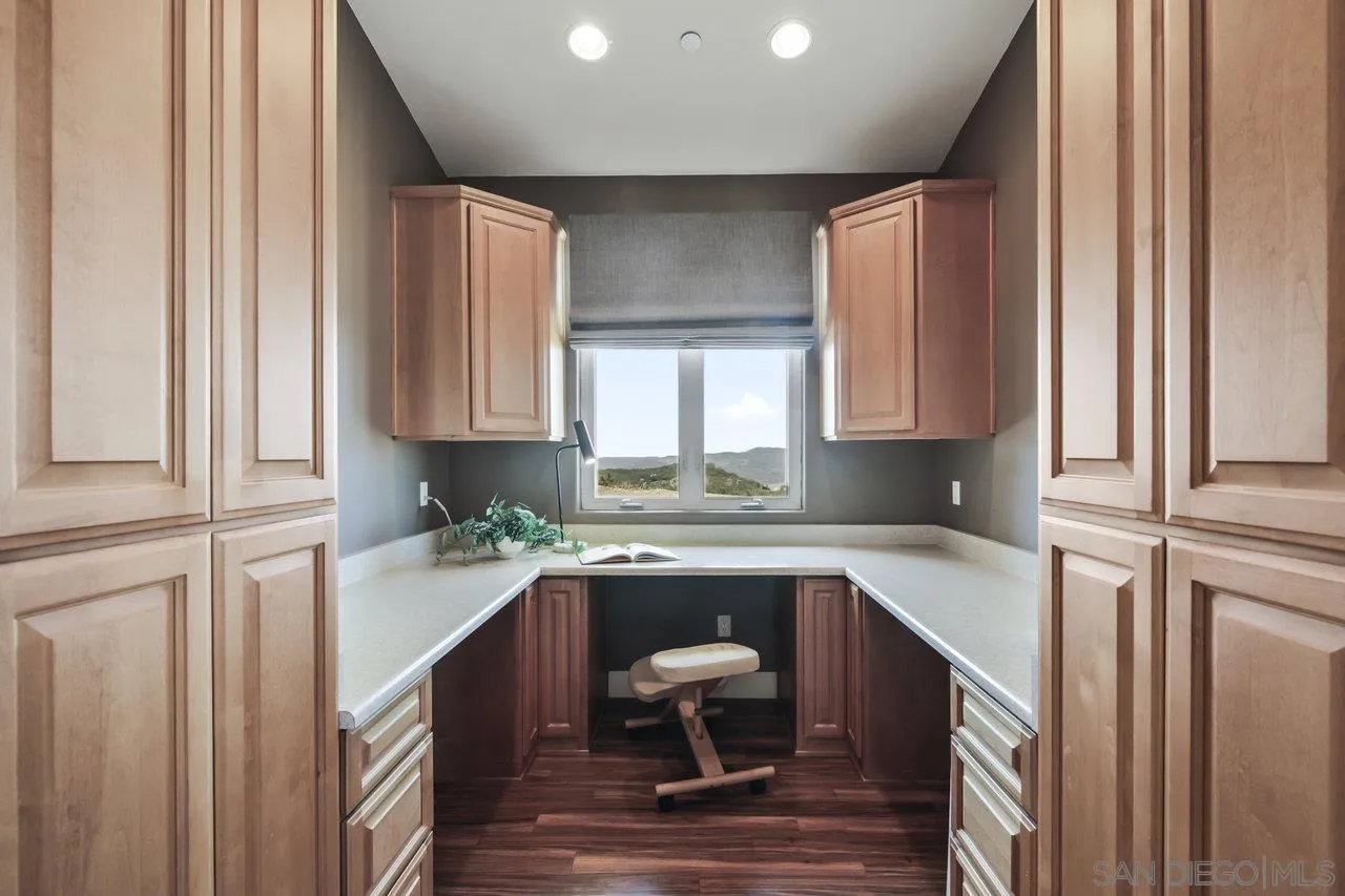 13192 Yerba Valley Way Lakeside, CA 92040 - Photo 27 of 58 a kitchen with a sink cabinets and window