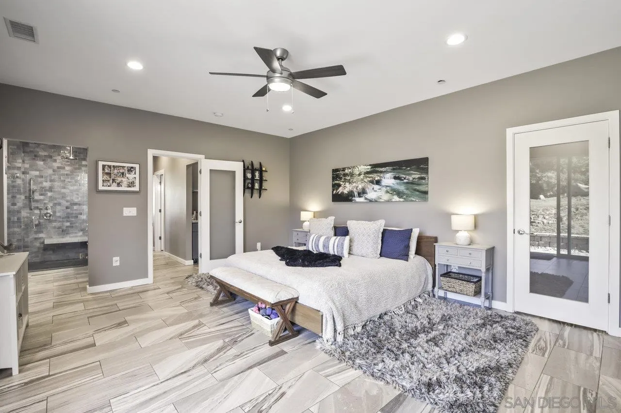 13192 Yerba Valley Way Lakeside, CA 92040 - Photo 43 of 58 a living room with furniture and a chandelier