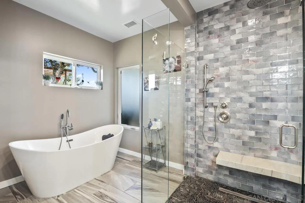 13192 Yerba Valley Way Lakeside, CA 92040 - Photo 45 of 58 a bathroom with a bathtub and shower