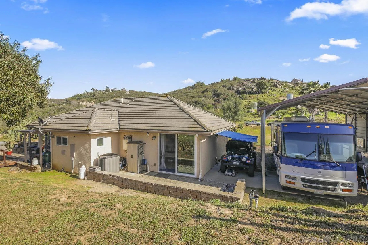 13192 Yerba Valley Way Lakeside, CA 92040 - Photo 52 of 58 a front view of a house with a yard