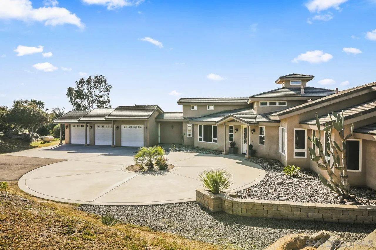13192 Yerba Valley Way Lakeside, CA 92040 - Photo 10 of 58 a front view of a house with a yard