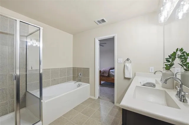 a bathroom with a sink and a bathtub