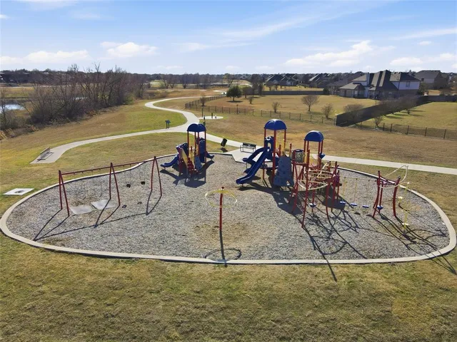 a view of a swimming pool with an outdoor space