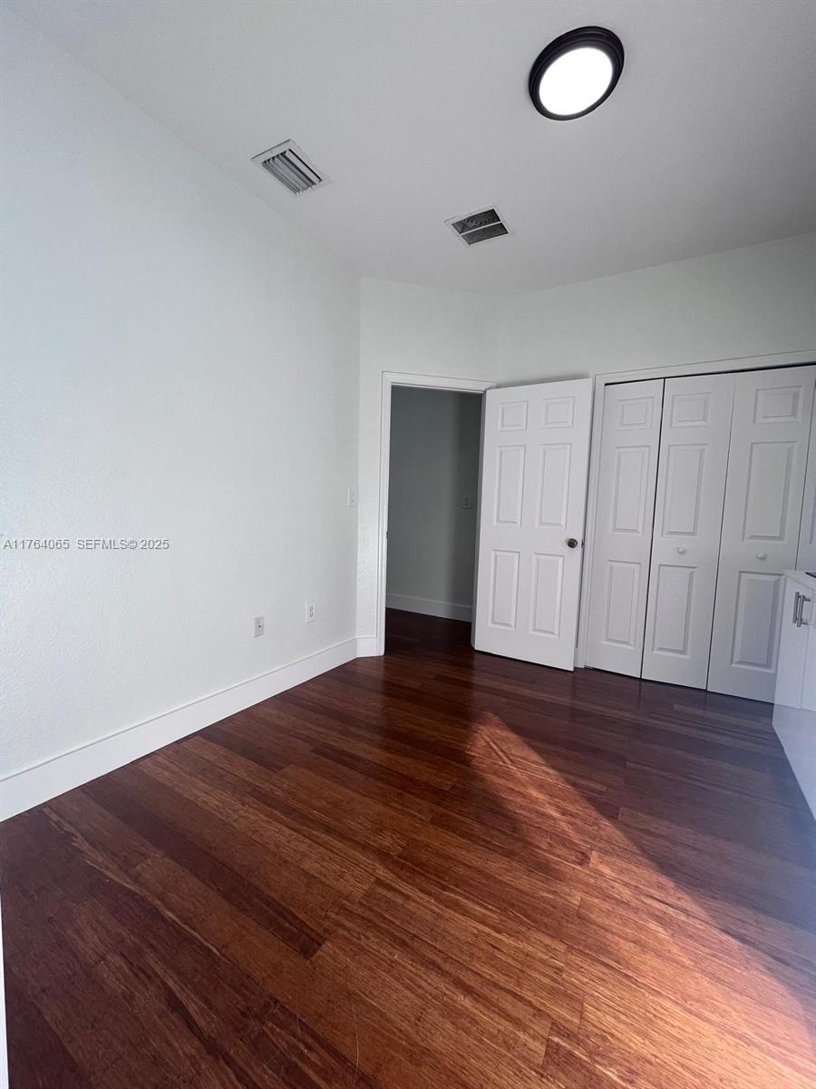 22937 Southwest 9th Avenue, Unit 1 Miami, FL 33170 - Photo 8 of 19 a view of a livingroom with wooden floor