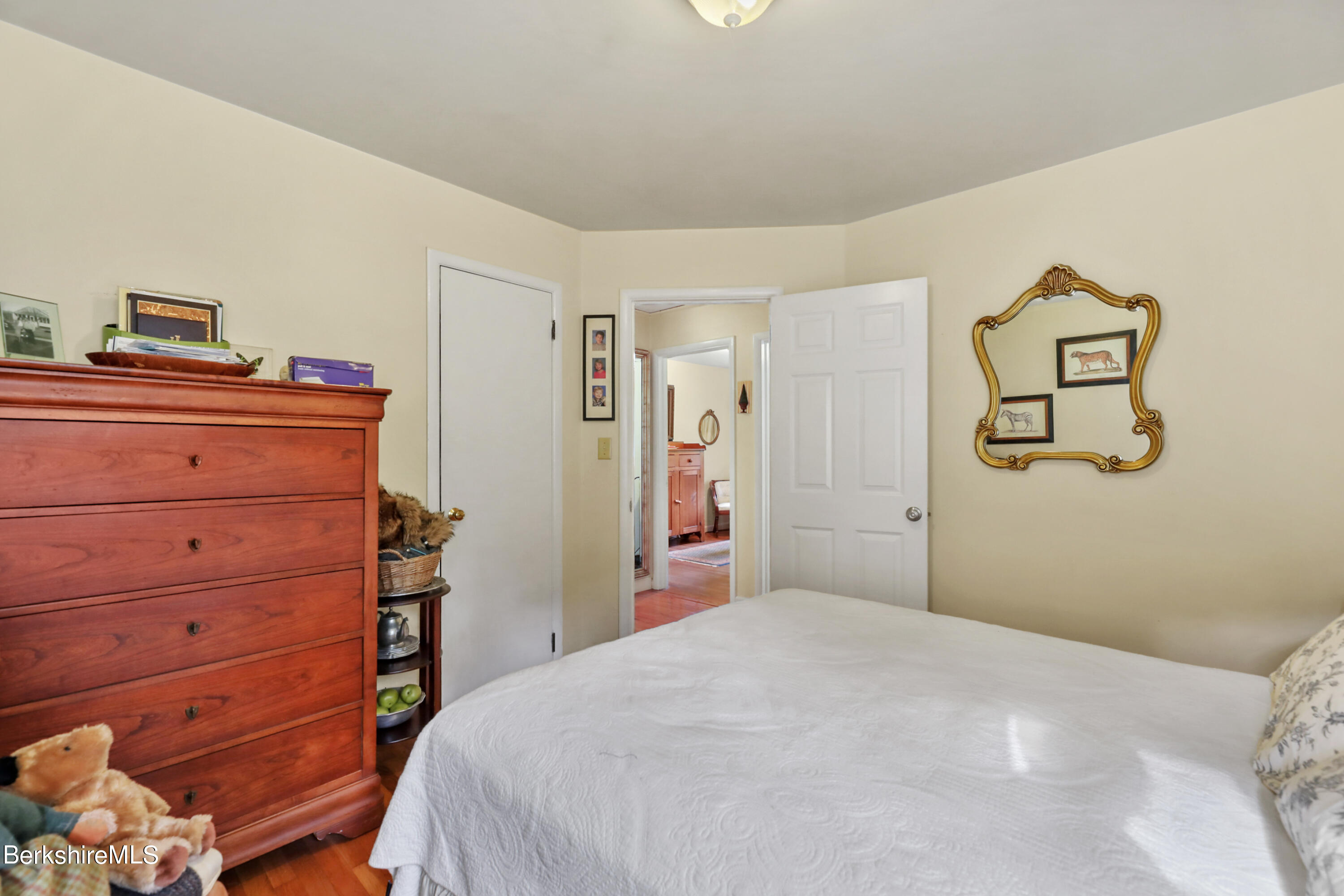 16 East New Lenox Road Lenox, MA 01240 - Photo 14 of 28 a bedroom with a bed and a dresser