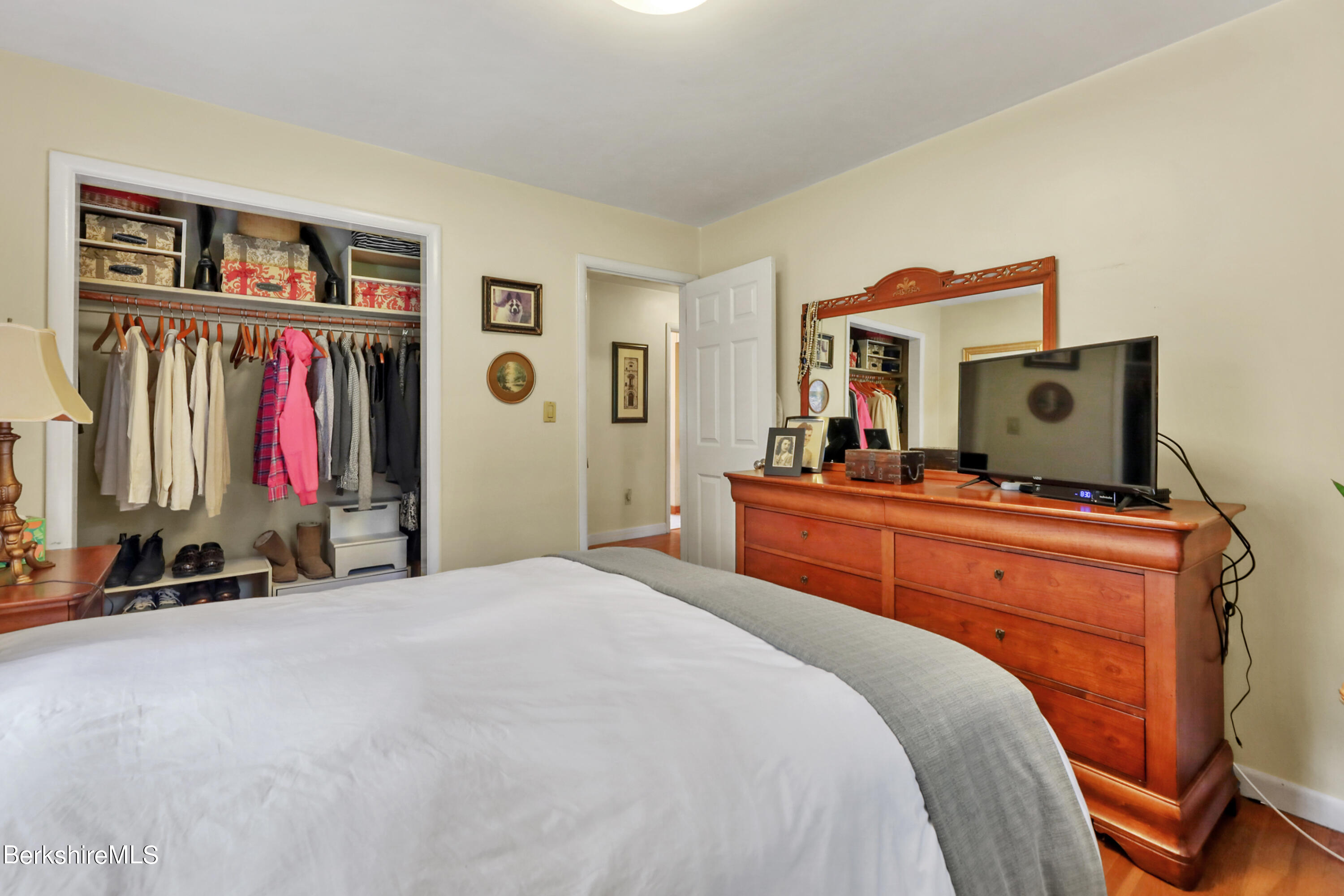 16 East New Lenox Road Lenox, MA 01240 - Photo 16 of 28 a bedroom with a bed and a closet