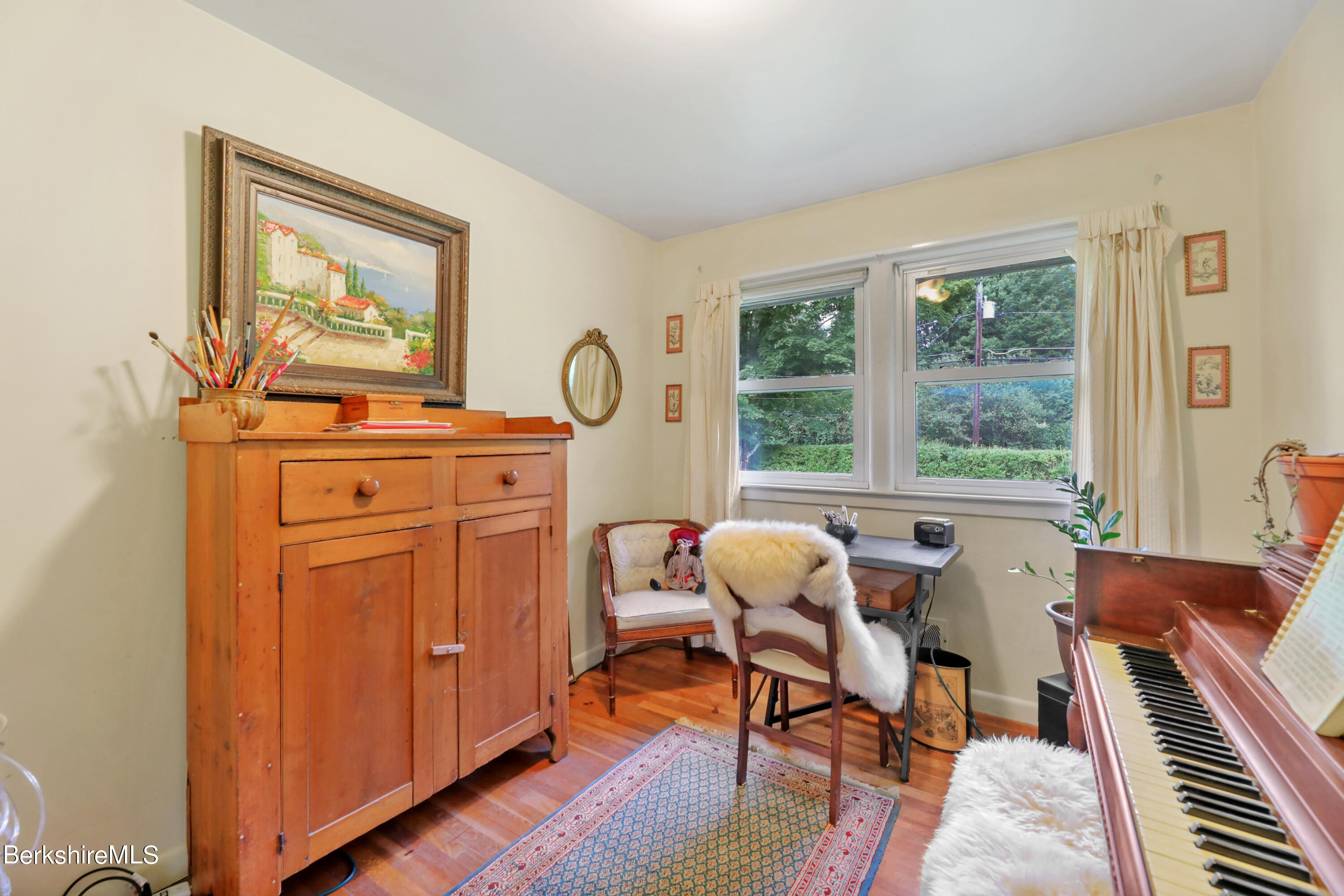16 East New Lenox Road Lenox, MA 01240 - Photo 17 of 28 a view of a workspace with furniture and a window