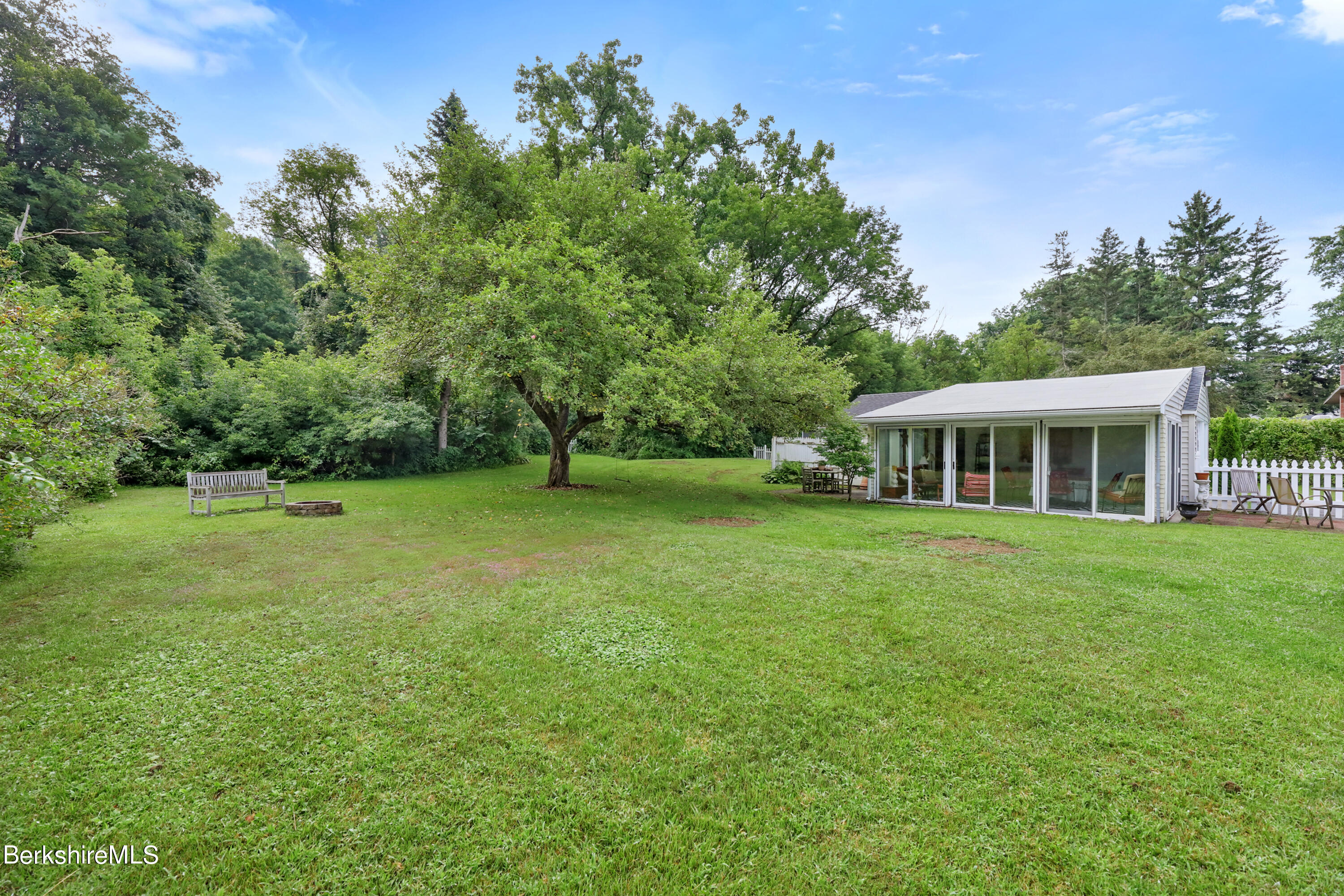 16 East New Lenox Road Lenox, MA 01240 - Photo 21 of 28 a front view of a house with a garden