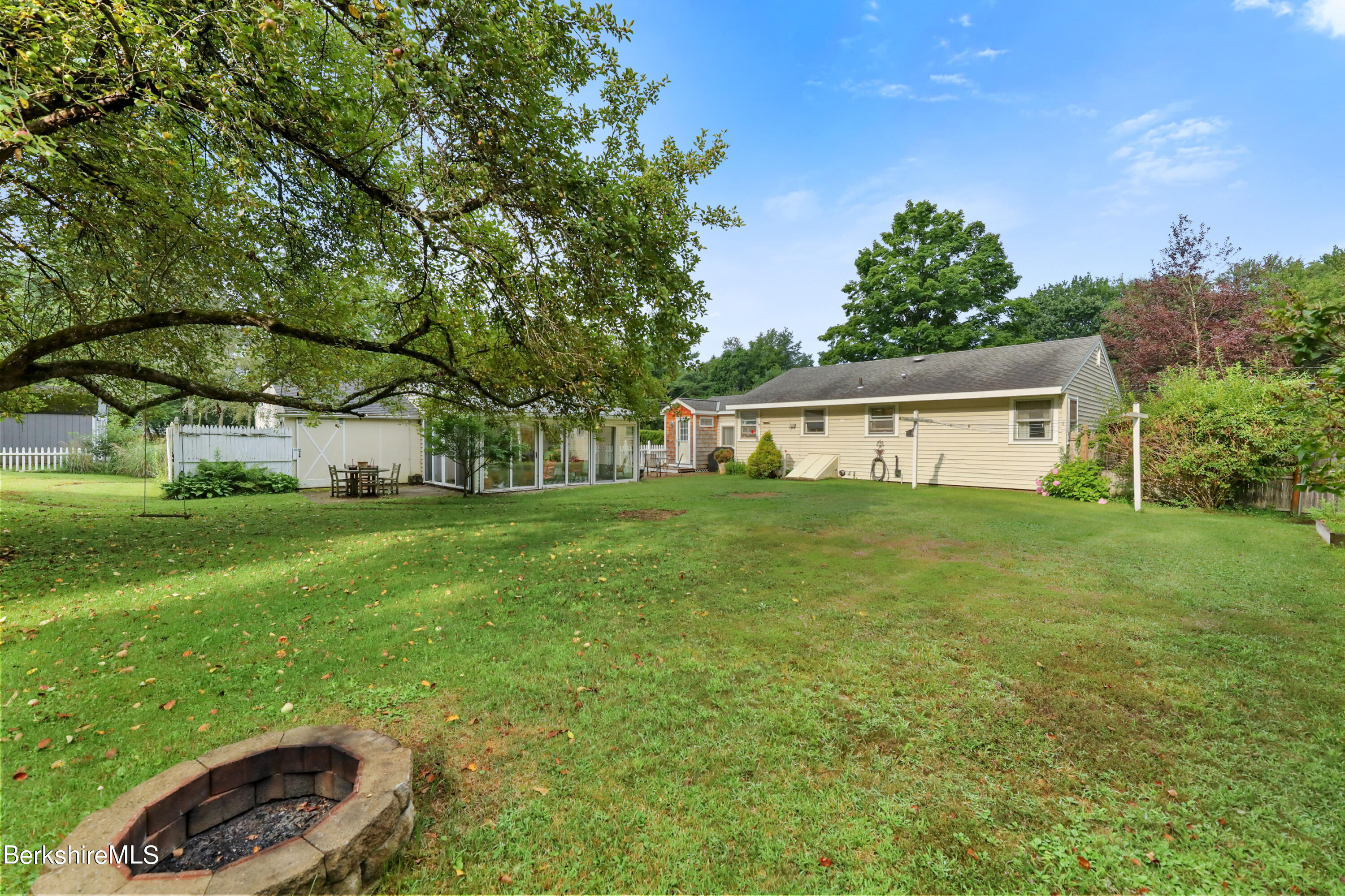 16 East New Lenox Road Lenox, MA 01240 - Photo 22 of 28 a front view of house with yard and green space