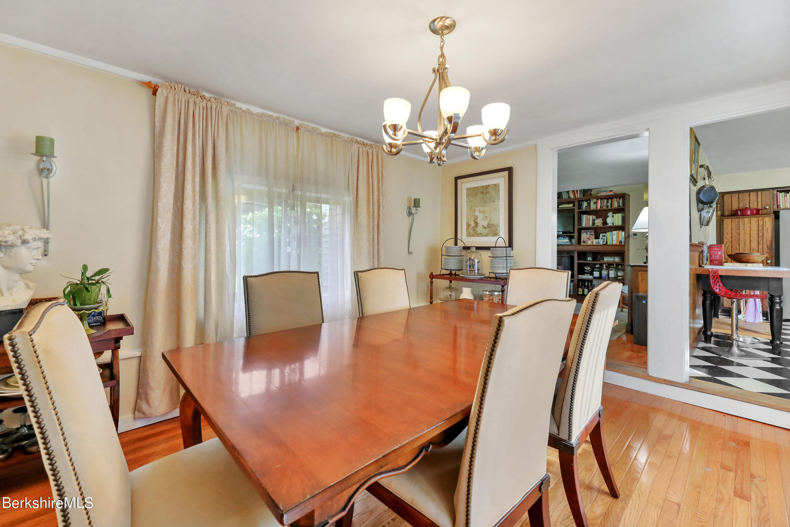 16 East New Lenox Road Lenox, MA 01240 - Photo 8 of 28 a view of a dining room with furniture window and wooden floor