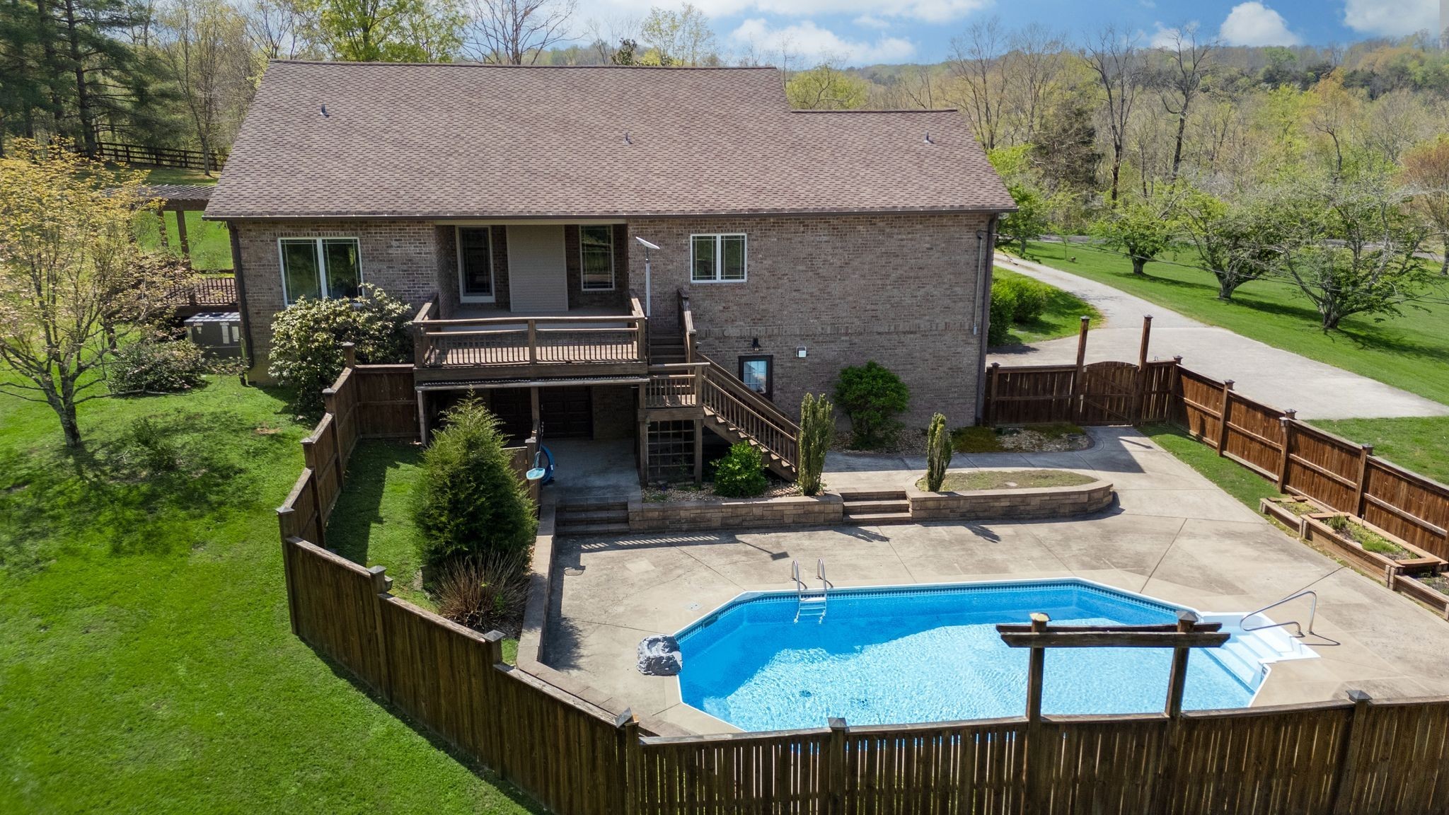 1249 White Road Bon Aqua, TN 37025 - Photo 60 of 60 a view of house with swimming pool and outdoor seating