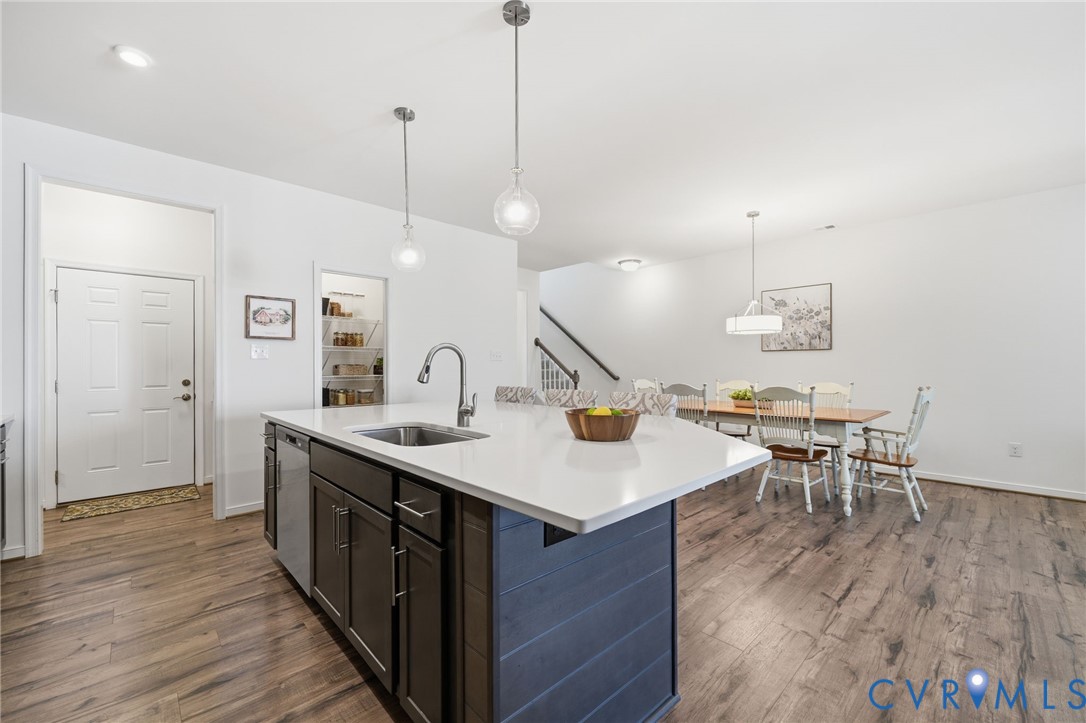 9204 Cerulean Place Richmond, VA 23238 - Photo 17 of 62 a kitchen with a table and chairs in it