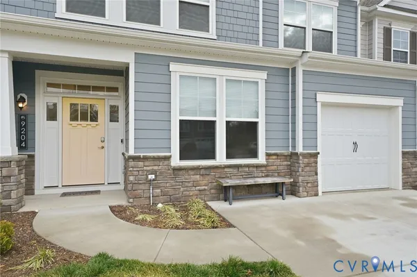 a front view of a house with entertaining space