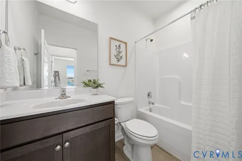 a kitchen with a table and chairs in it