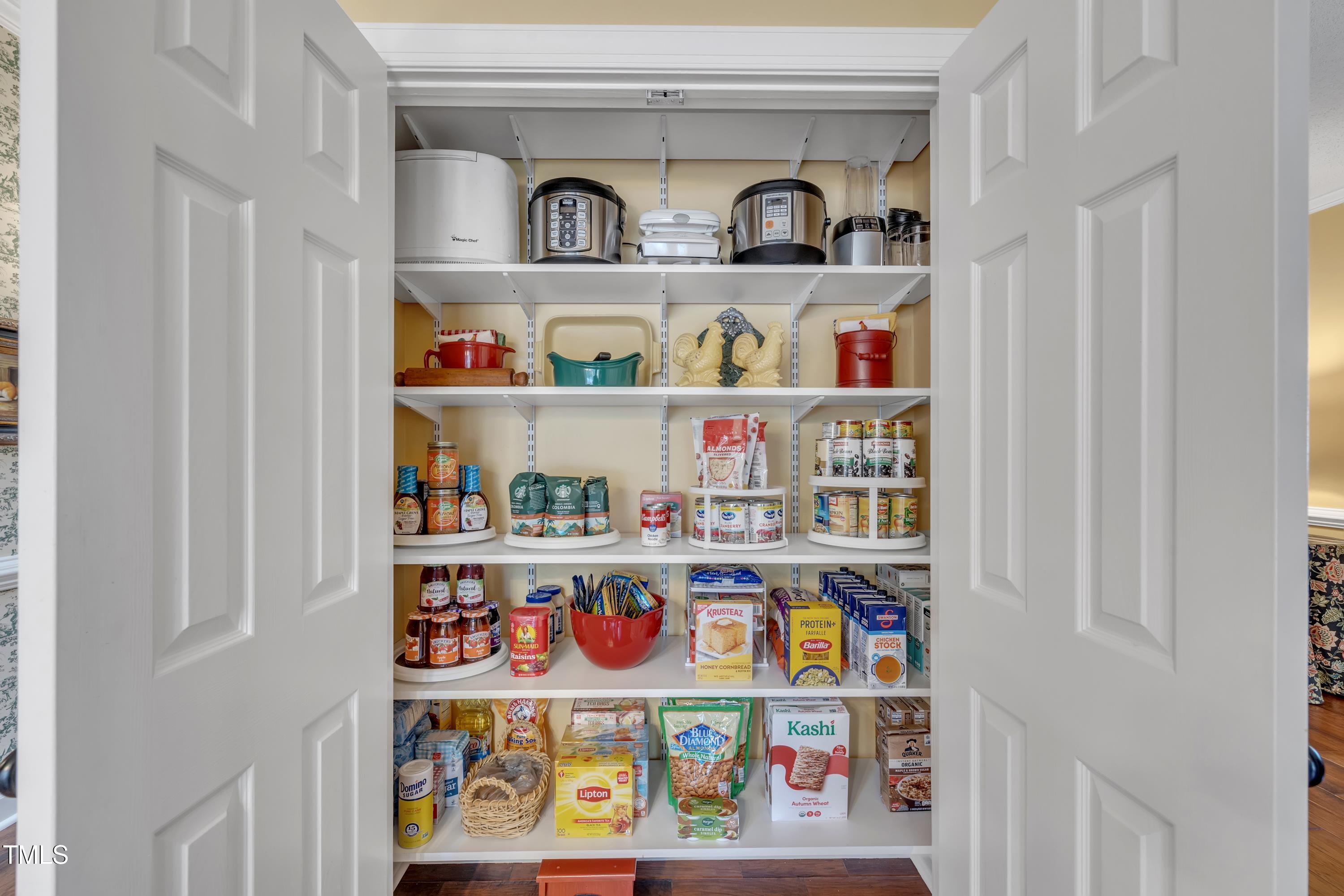 1100 Queensbury Circle Durham, NC 27713 - Photo 13 of 35 a cabinet with fridge and closet