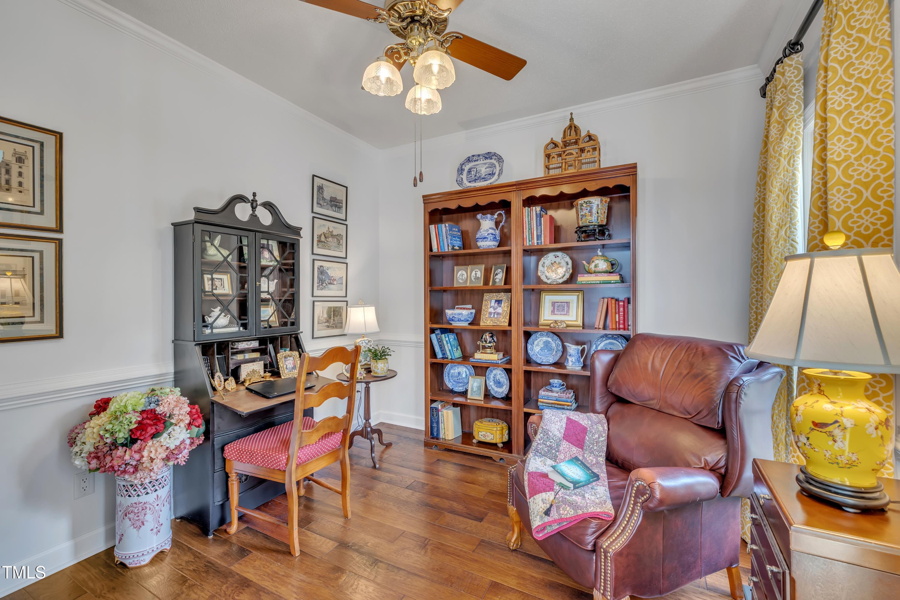 1100 Queensbury Circle Durham, NC 27713 - Photo 4 of 35 a living room with furniture and wooden floor