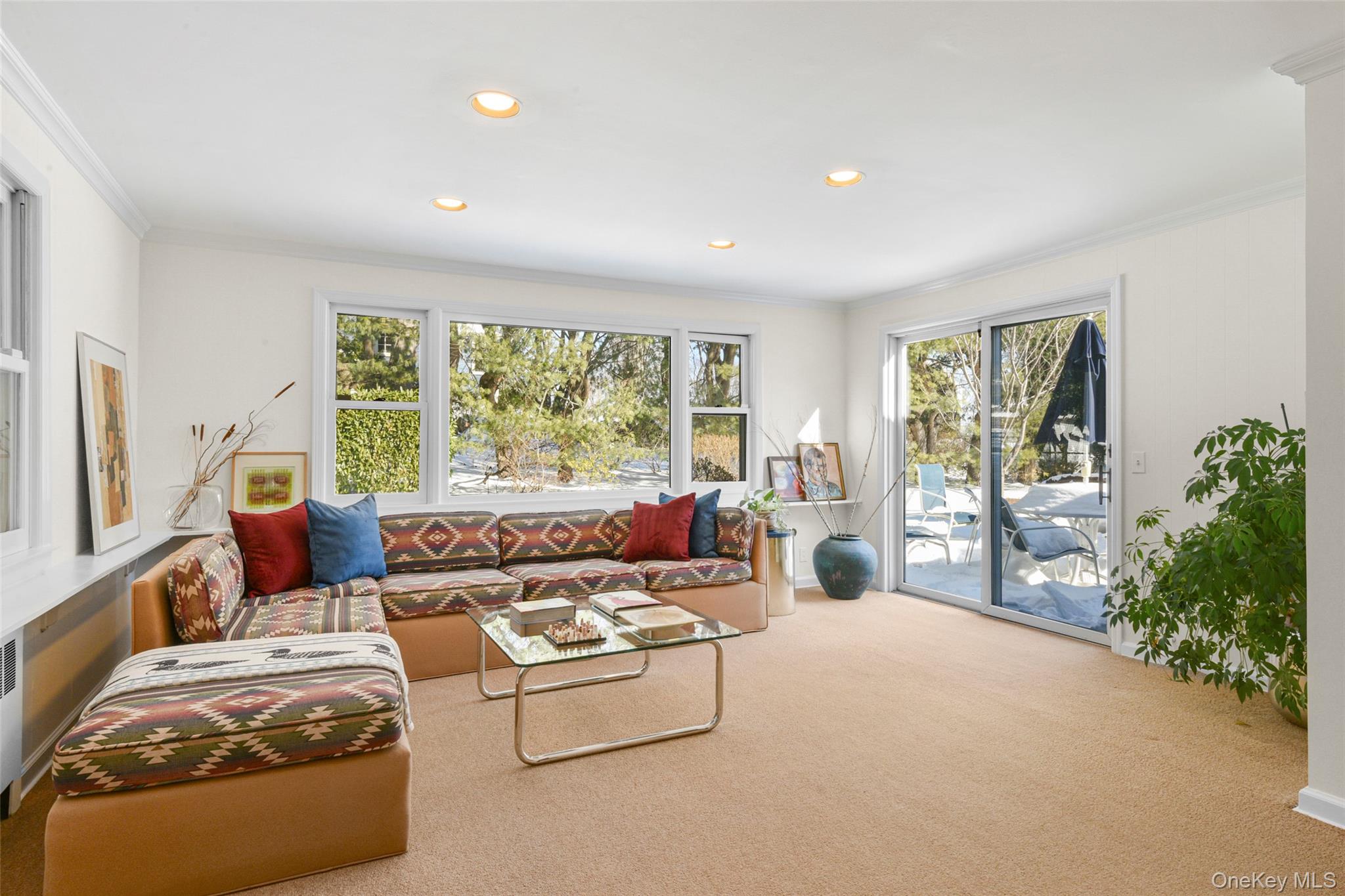 1 Highridge Road Larchmont, NY 10538 - Photo 11 of 33 Sliding glass doors to bluestone patio