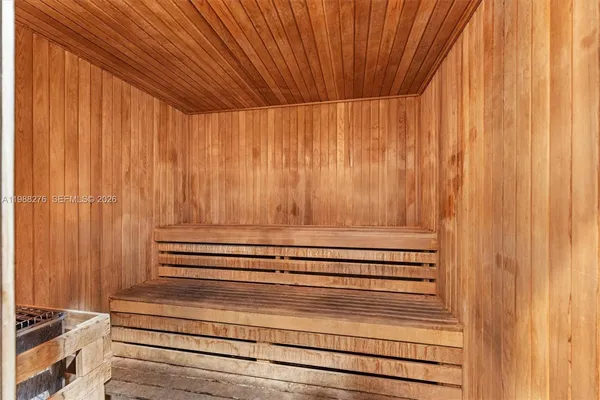 a reading room with furniture and a window