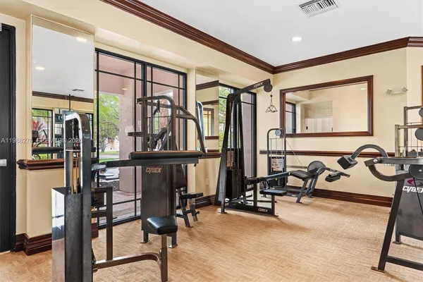 a view of balcony with wooden floor and windows