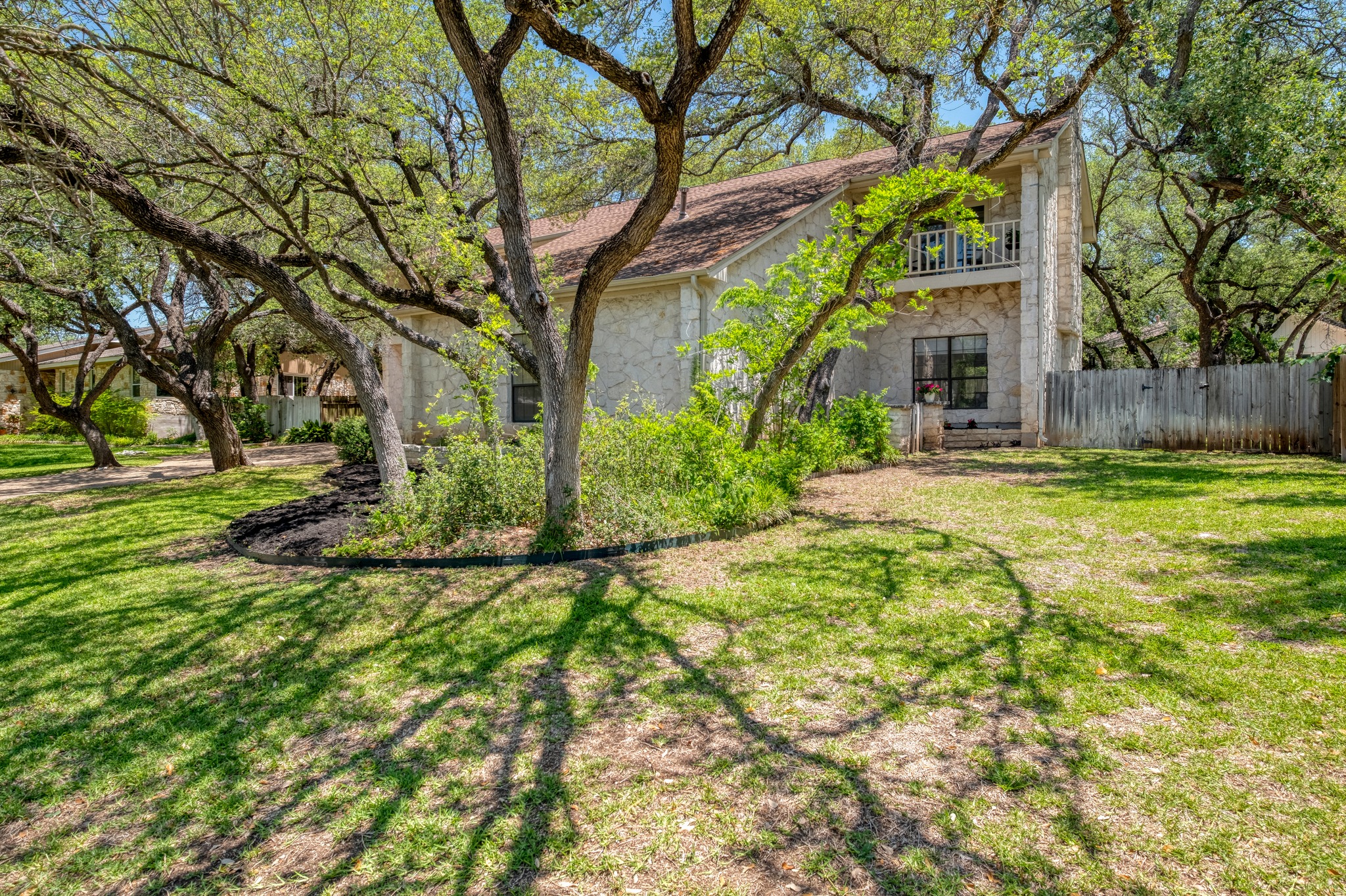 202 Ridgewood Drive Georgetown, TX 78628 - Photo 3 of 40 a backyard of a house with lots of green space