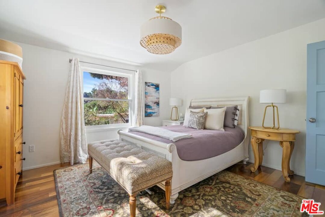 2850 Nichols Canyon Road Los Angeles, CA 90046 - Photo 15 of 38 a bed room with a bed and a window