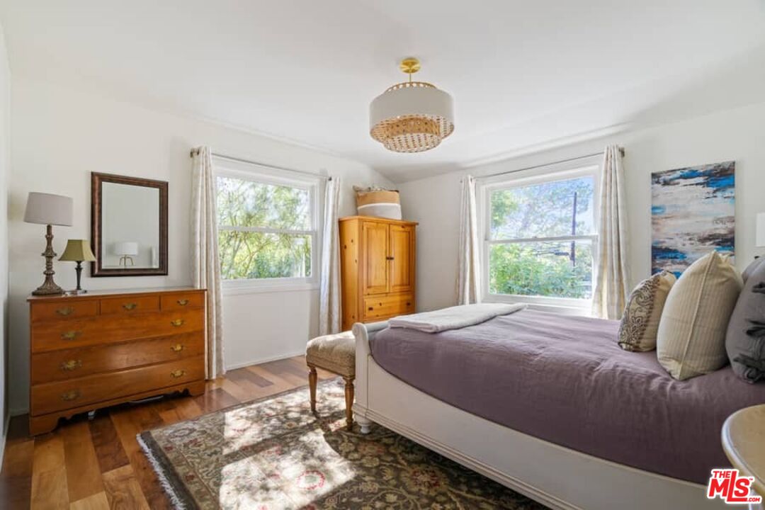 2850 Nichols Canyon Road Los Angeles, CA 90046 - Photo 16 of 38 a bedroom with a bed and a window