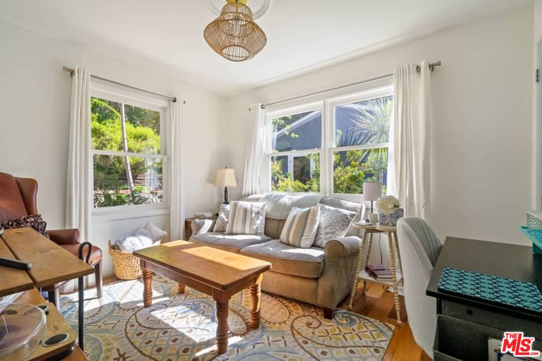 2850 Nichols Canyon Road Los Angeles, CA 90046 - Photo 21 of 38 a living room with furniture and a window