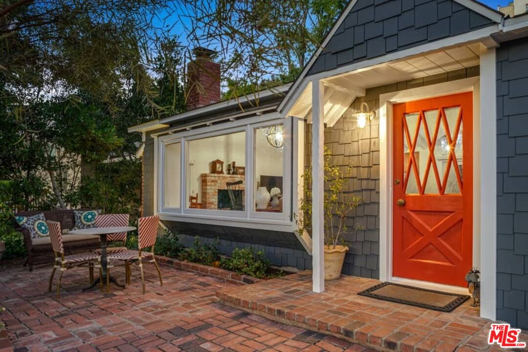 2850 Nichols Canyon Road Los Angeles, CA 90046 - Photo 33 of 38 a front view of a house with outdoor seating