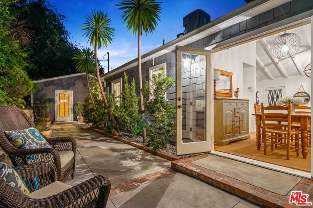 2850 Nichols Canyon Road Los Angeles, CA 90046 - Photo 36 of 38 a view of balcony with two chairs and a potted plant